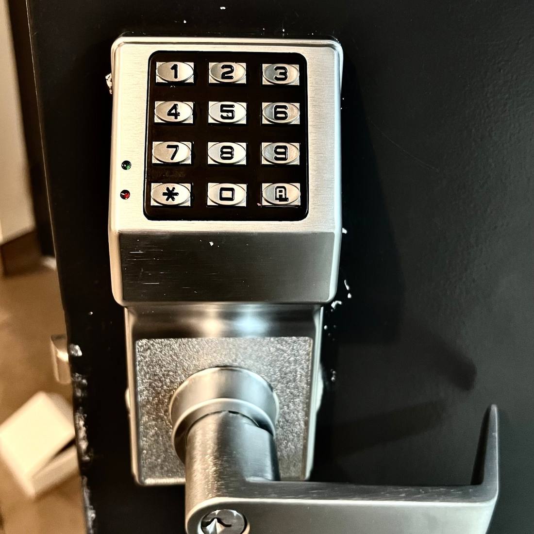 Heavy-duty commercial keypad lever lock installed on a Brooklyn business door by Aura Locksmith