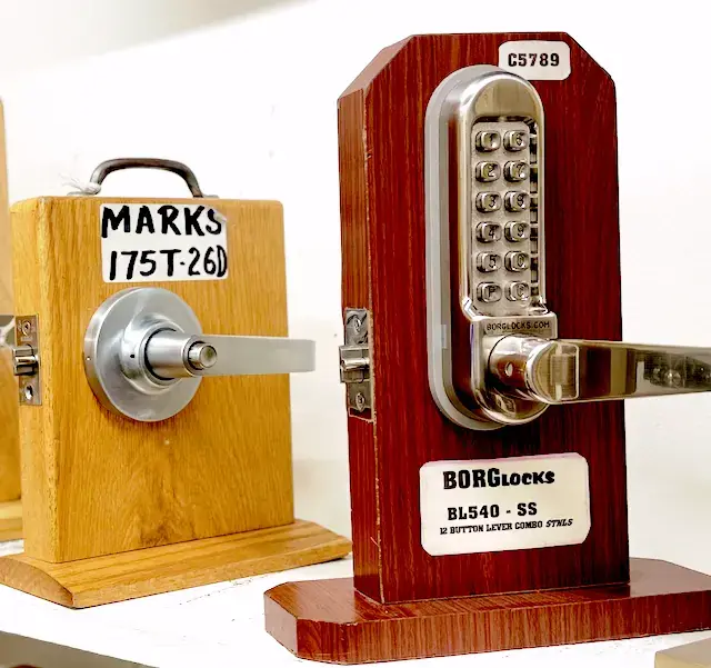 Marks 175T mortise lever and BORGlocks BL540 keypad lock displayed on test boards at Aura Locksmith, Brooklyn