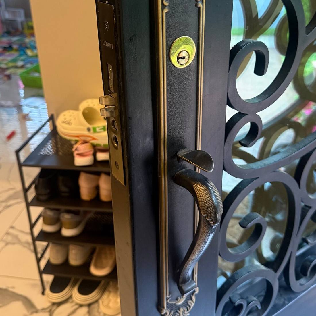 High-security Lokin smart lock and multi-point deadbolt installed on a Brooklyn front door by Aura Locksmith